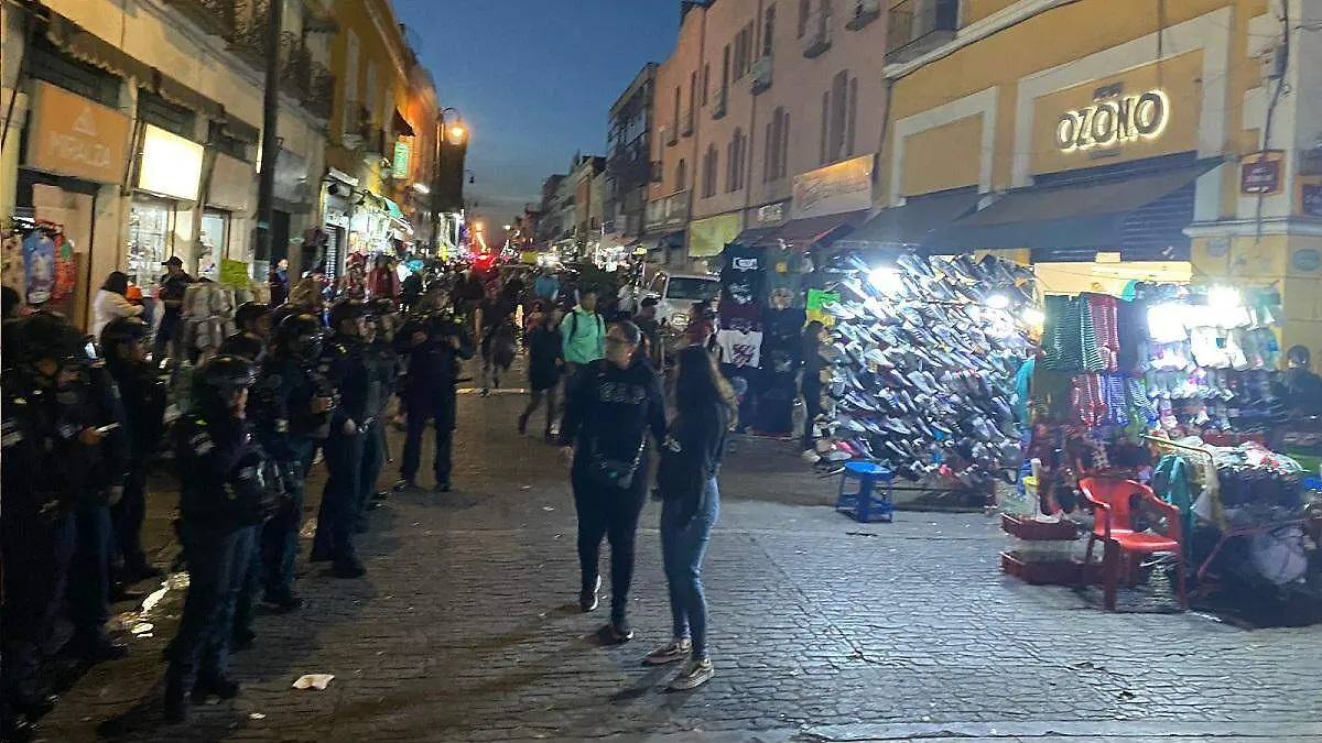 Un hombre baleado deja riña de ambulantes en la 8 poniente y 5 de mayo